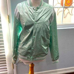 Mitchell & Ness satin jacket with quilted inner lining. Snap up